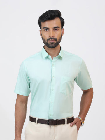 Oil Green Shirt, a green cotton shirt with a tailored fit and short sleeves.