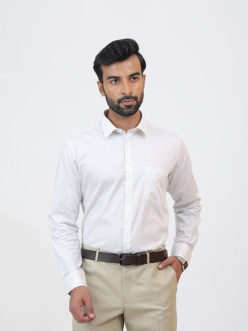 Earthy Snowflake Shirt, made with a subtle print on white textured cotton fabric and having a tailored fit and long sleeves.